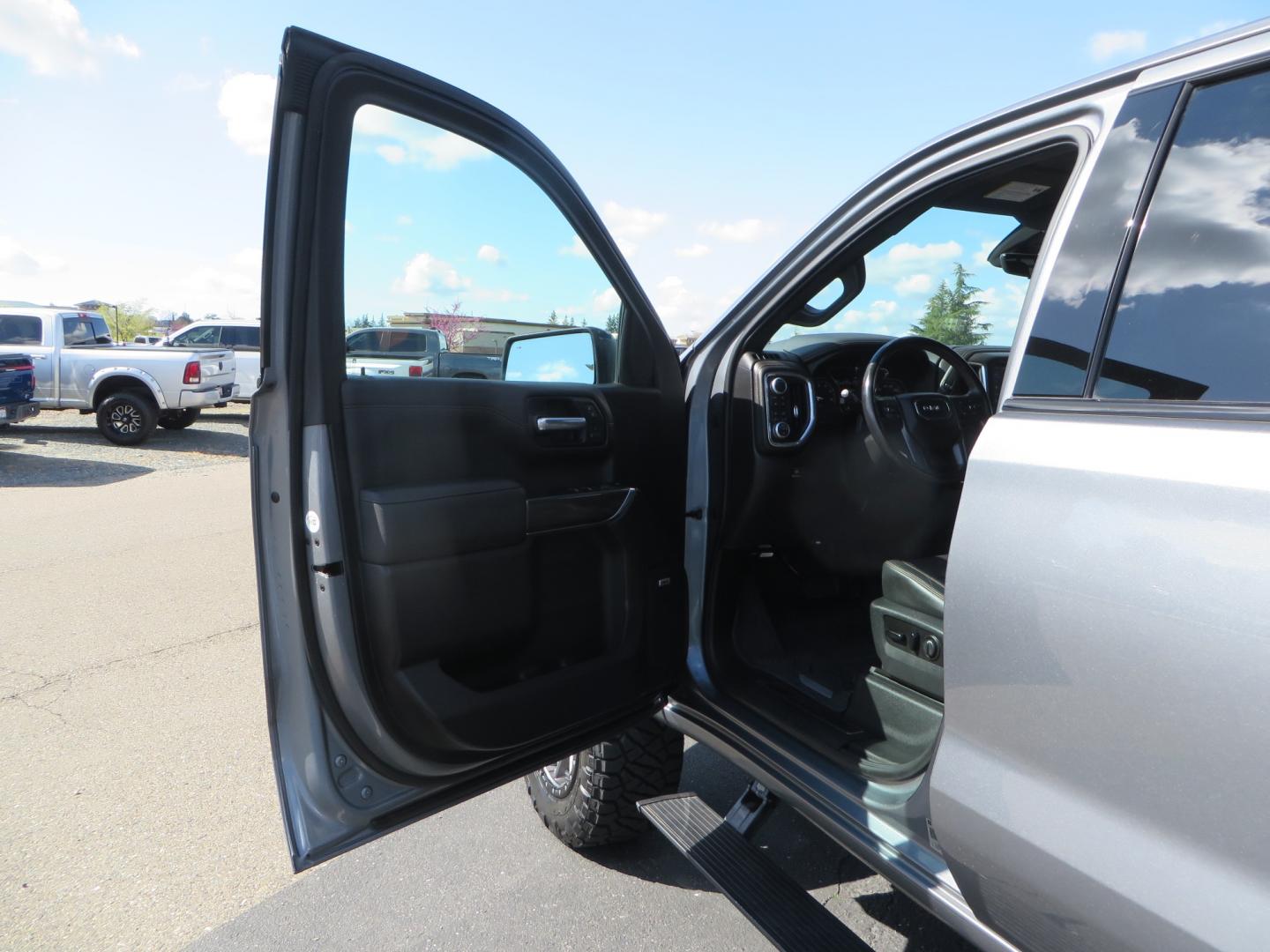 2019 CHARCOAL /BLACK GMC Sierra 1500 AT4 Crew Cab Long Box 4WD (1GTP9EEL6KZ) with an 6.2L V8 OHV 16V engine, 6A transmission, located at 2630 Grass Valley Highway, Auburn, CA, 95603, (530) 508-5100, 38.937893, -121.095482 - Dont miss this AT4 featuring a 4" RC lift kit kit, 35" Nitto Ridge Grappler tires, 20" Fuel Rebel wheels, Amp POwer steps, Air Bags, and a Tyger Bed cover. - Photo#14